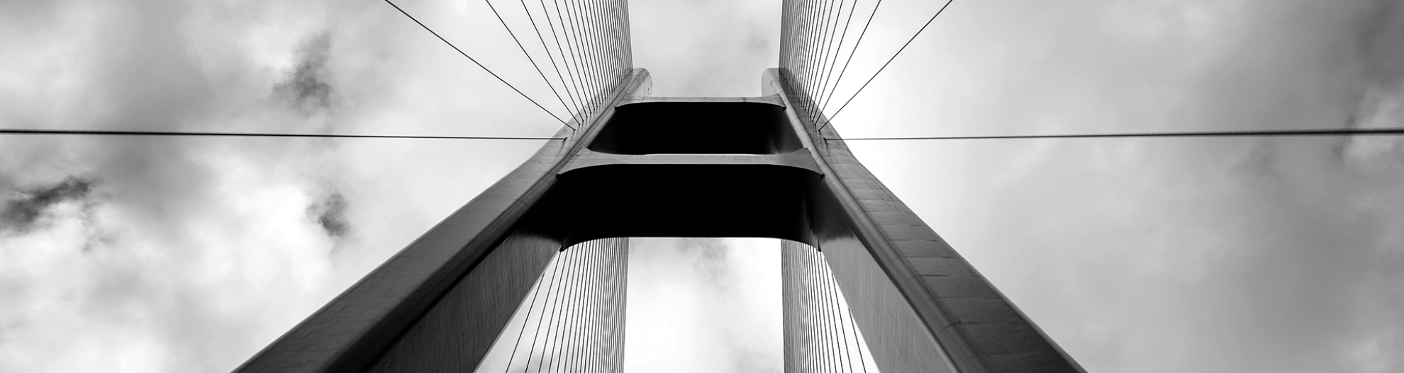 upward view of a bridge with cables